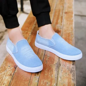 Mocassins en jean clair délavé et déchiré pour femme